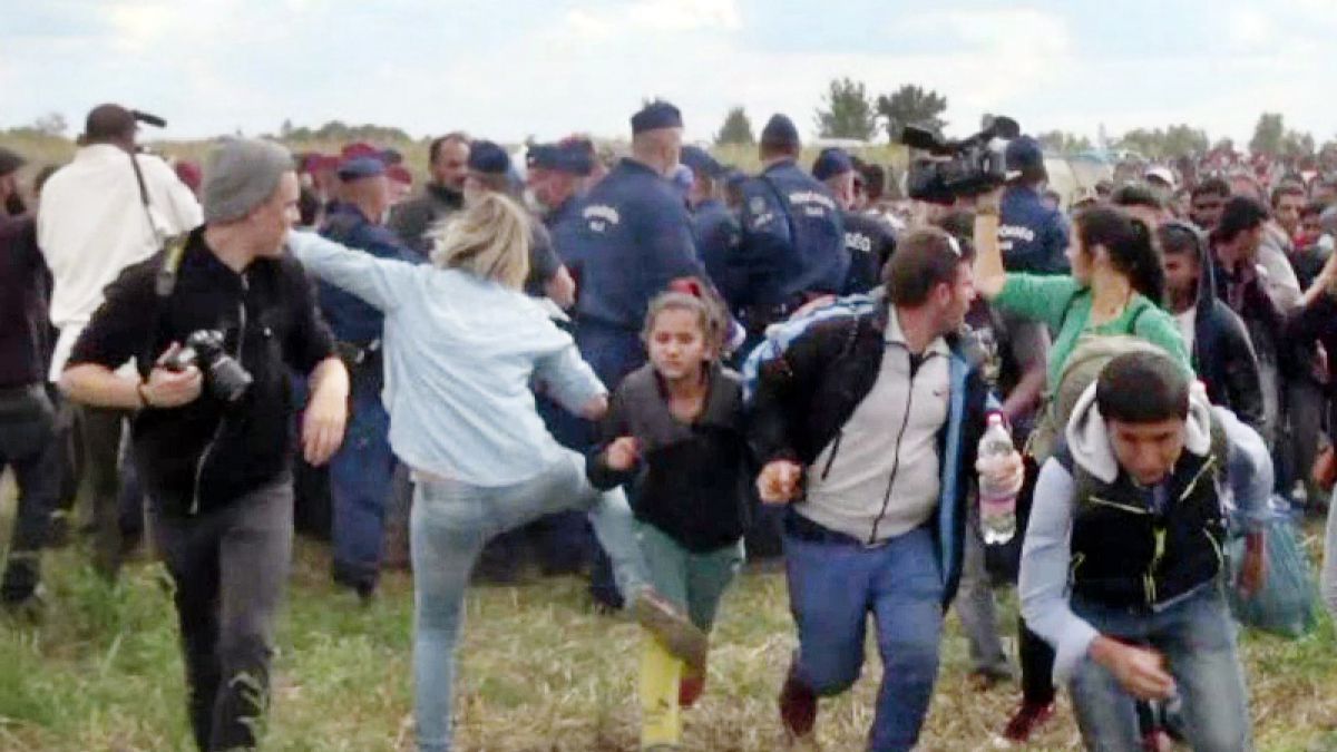 Hungarian camerawoman who kicked migrants is acquitted