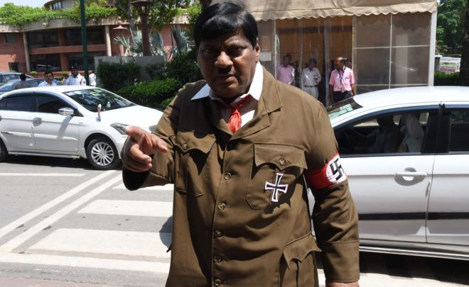 India MP shocks with Hitler costume protest in parliament