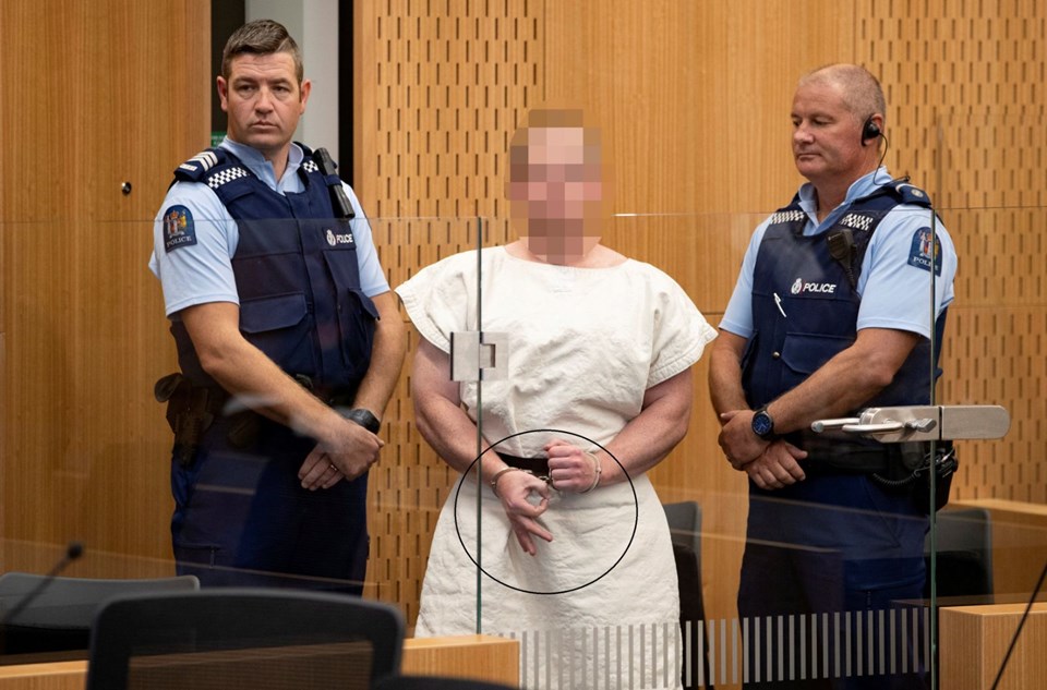 NZ mosque attacks suspect flashes ‘white power’ sign in court