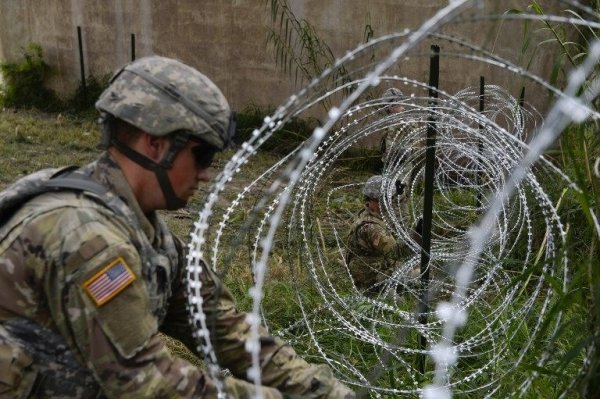 US troops seen setting up barbed wire near Mexico border