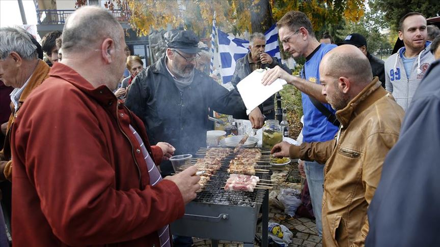 Greek nationalists’ pork-and-booze barbecue targets Muslim refugees