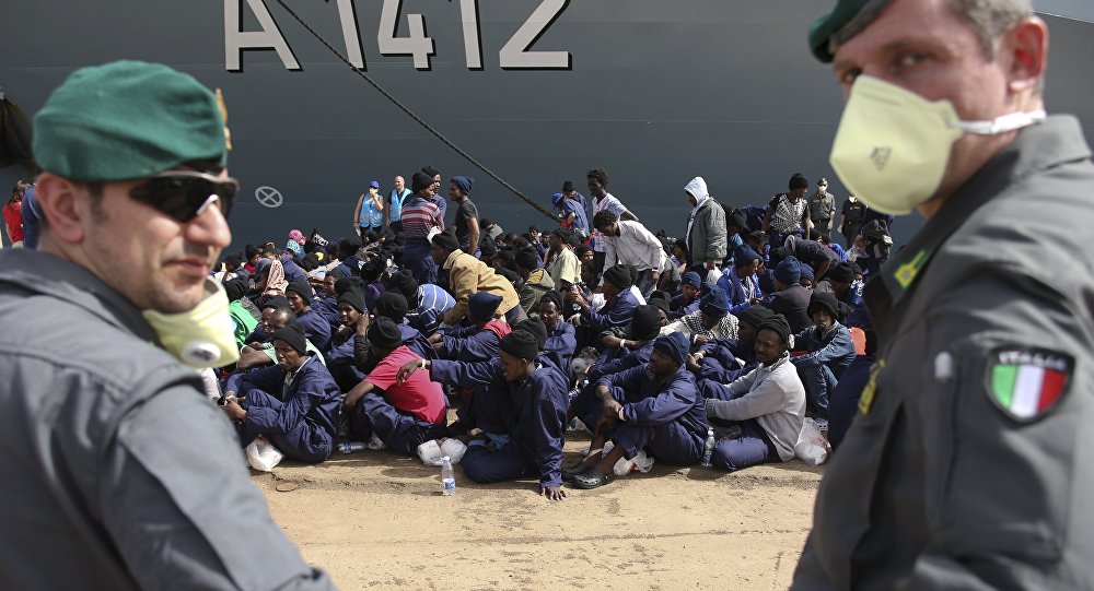 Dozens of migrants still stuck on vessel in Italy port