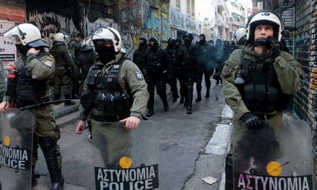 Athens police poised to evict refugees from squatted housing projects